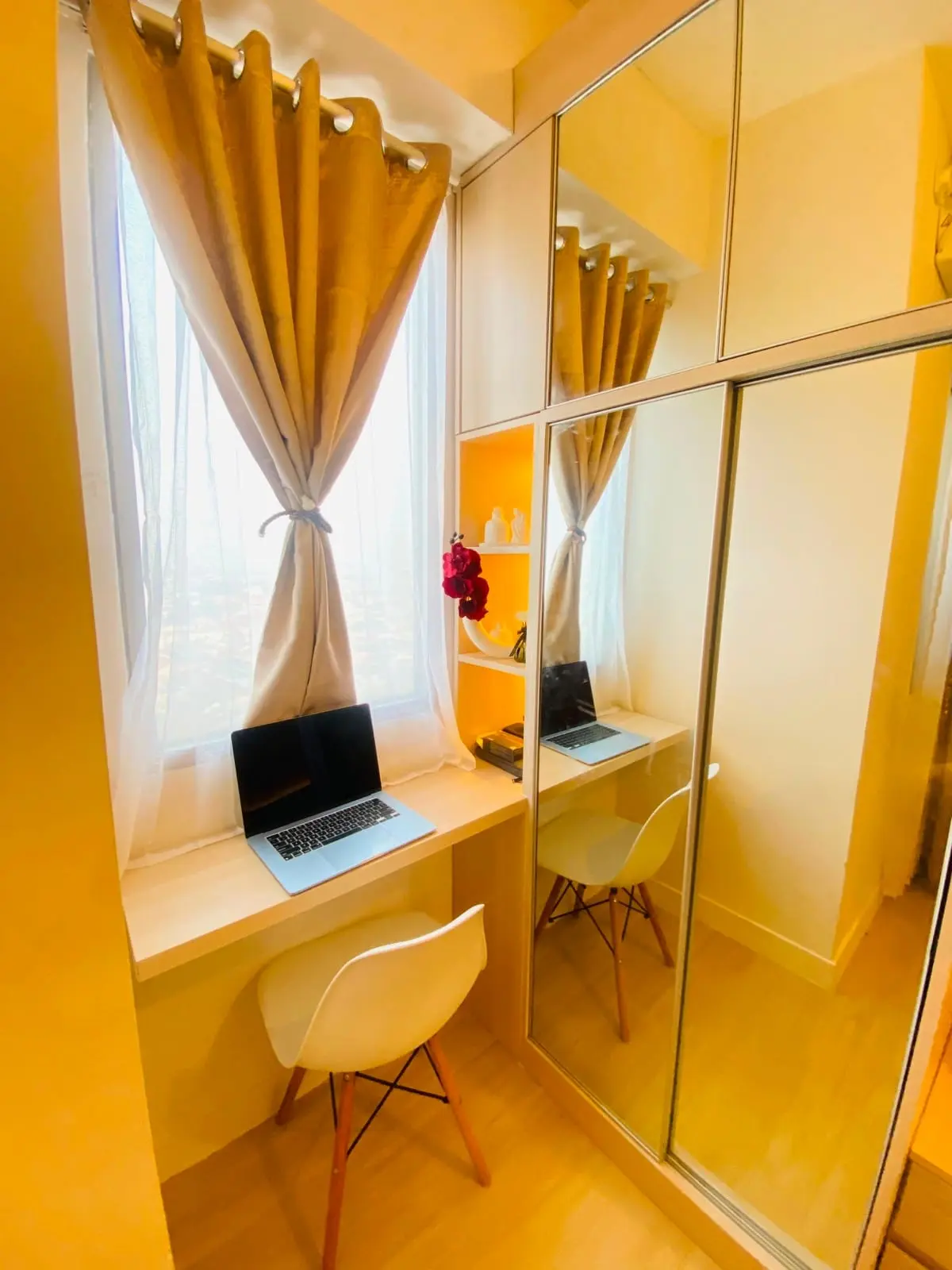 Lemari dan meja kerja di studio full furnished Grand Kamala Lagoon Bekasi.